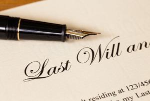 A pen is on top of the last will.